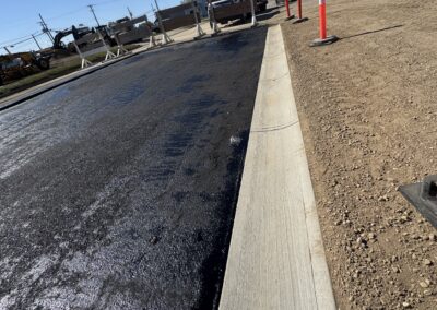 Weyburn Project - Asphalt roadway construction with curb